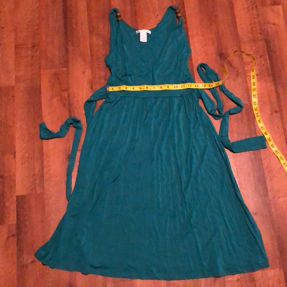 Teal green dress with wooden bead accents